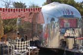 1960 Airstream Tradewind Trailer With Red Striped Side Canopy